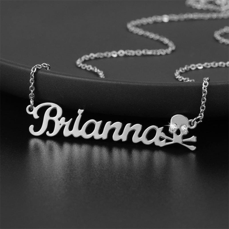 Crystal Skull Name Necklace with Pirate Design and Shimmering Eyes – Dazzling Jewelry.