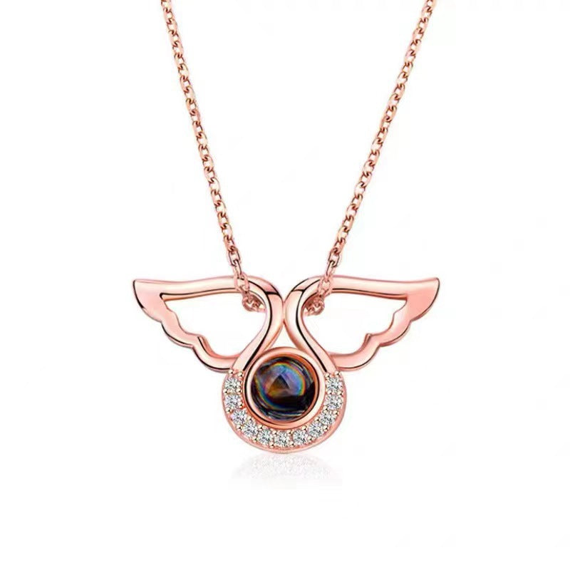 Customized angel wings projection necklace with 100 languages "I love you" and colorful photo.