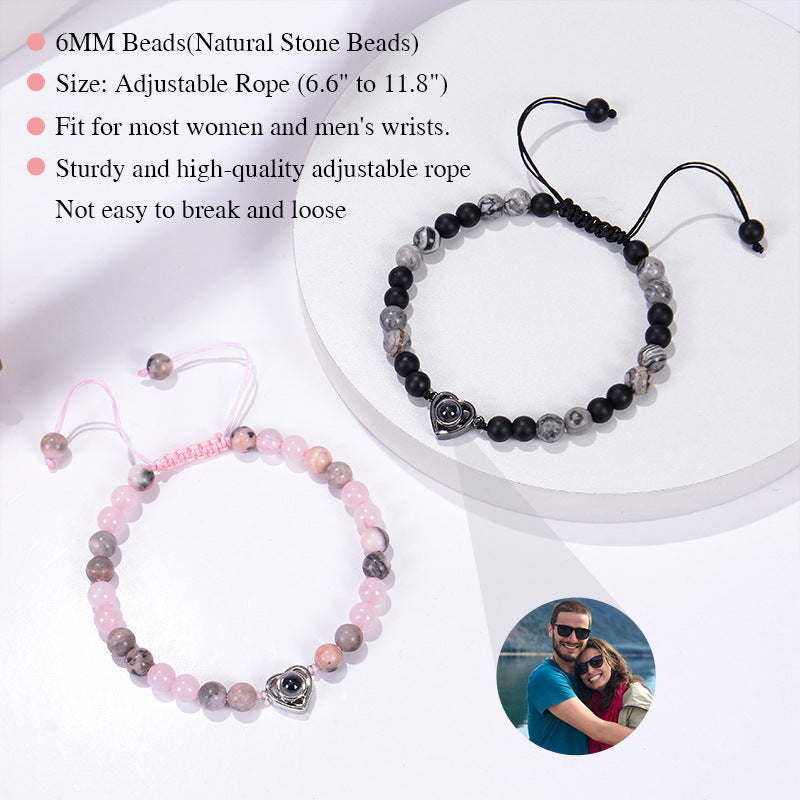 6mm black magnetic stone custom photo bracelet with matte finish and heart pendant projection.