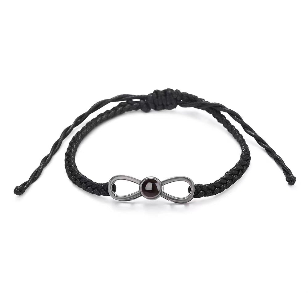 Korean-style bow braided bracelet with 100-language "I love you" photo projection, customizable for couples.
