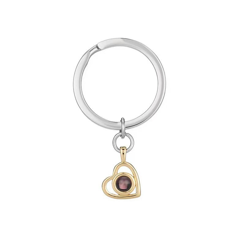 Customized heart necklace with 100 languages "I love you," featuring nano projection of color photos and text.