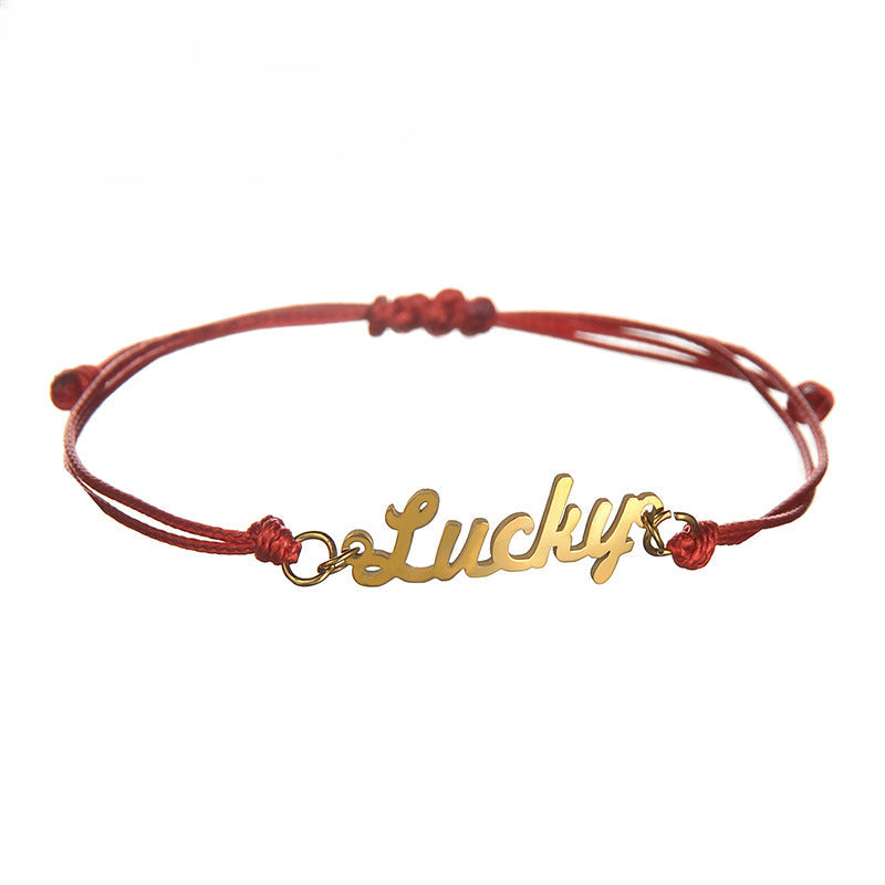 Custom stainless steel name bracelet with adjustable cord. Perfect for couples with personalized letter design.
