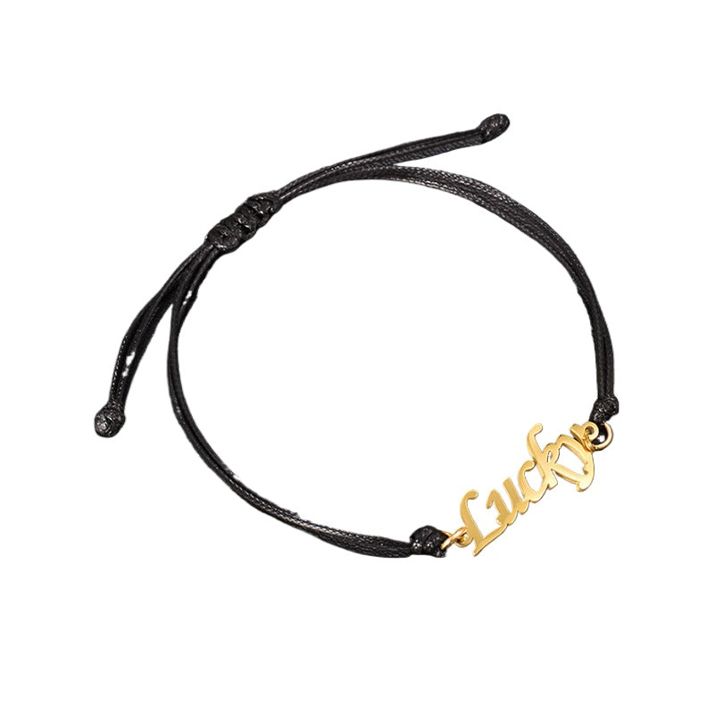 Custom stainless steel name bracelet with adjustable cord. Perfect for couples with personalized letter design.