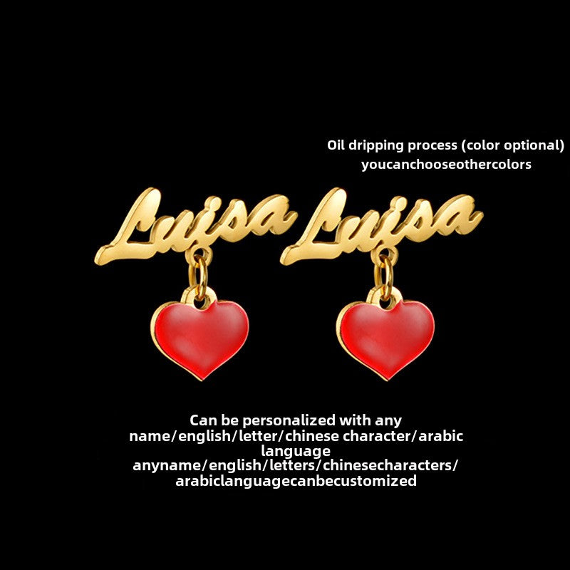 Custom name stud earrings with stainless steel letter and enamel heart. Perfect gift.