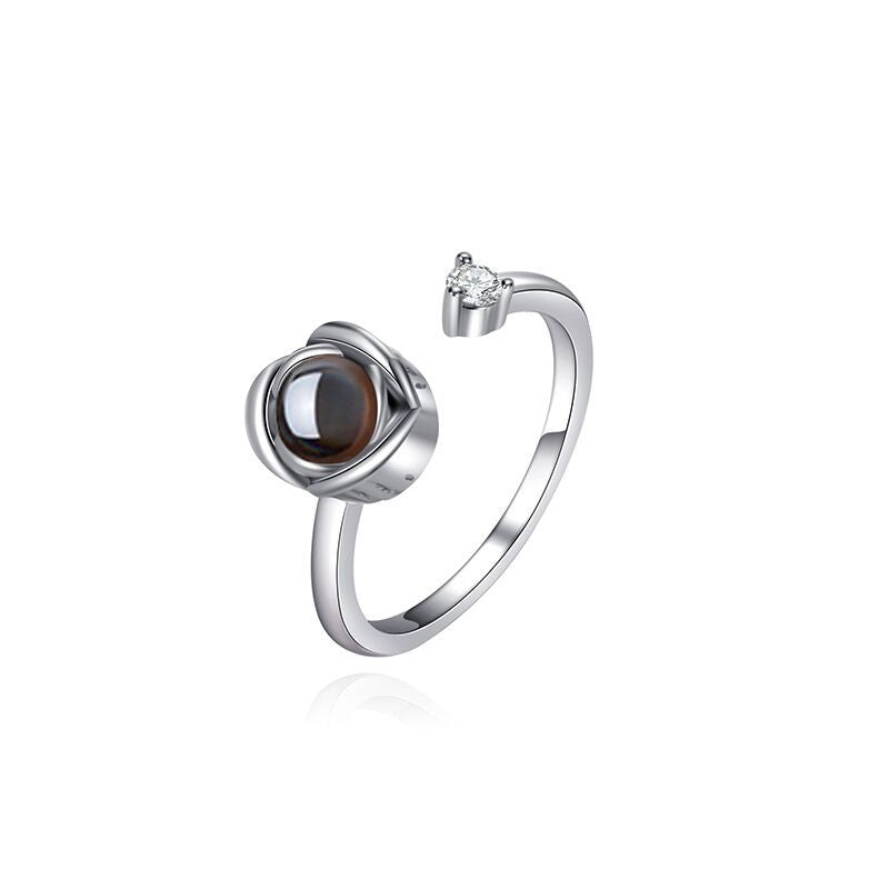 Custom projection couple rings for her feature "I Love You" in 100 languages. Adjustable open design, perfect as a memorable gift.