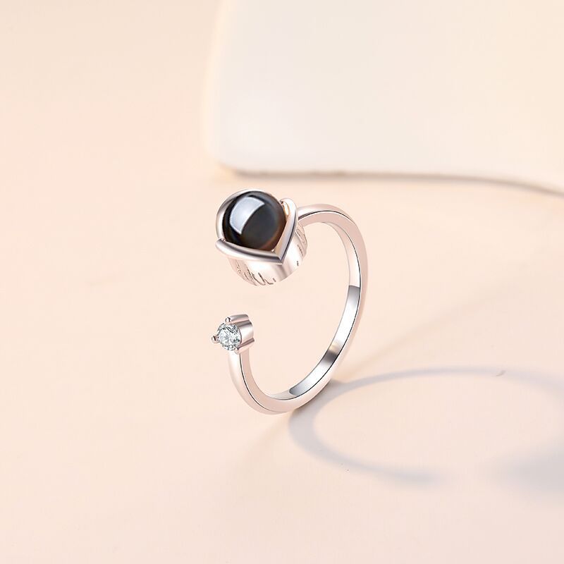 Custom projection couple rings for her feature "I Love You" in 100 languages. Adjustable open design, perfect as a memorable gift.