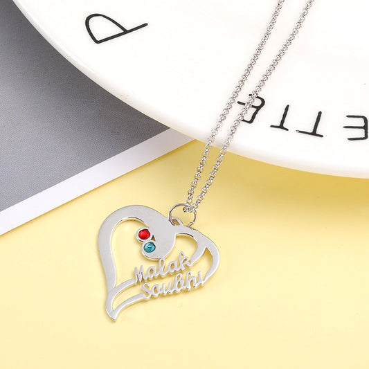 Fashion geometric heart-shaped birthstone necklace in silver, featuring custom lettering. Ideal for wholesale jewelry collections.