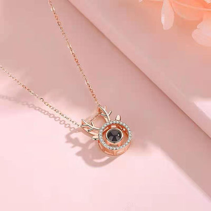 Custom "I Love You" photo projection necklace in 100 languages. Personalized with a photo and engraving, ideal gift for Valentine's Day or birthdays.