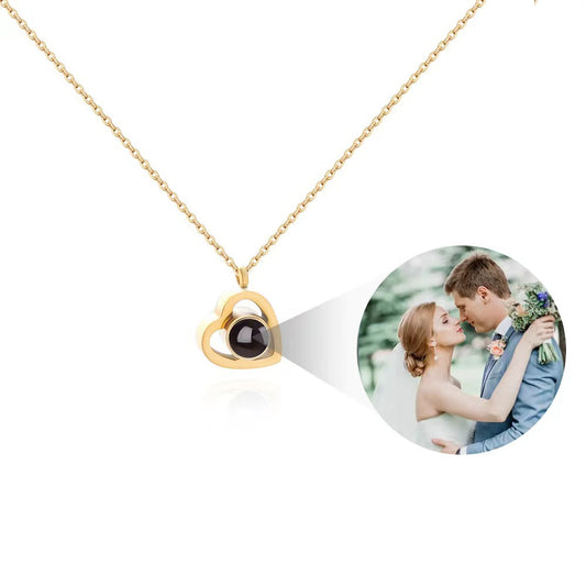Custom heart projection necklace featuring "I love you" in 100 languages, with colorful photo and text in durable titanium steel.
