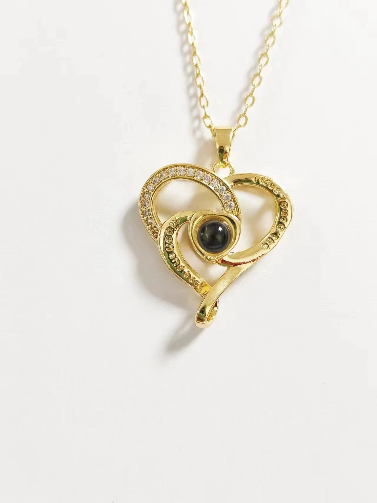 Hot-selling "I Love You" in 100 languages necklace, featuring a heart-shaped pendant, micro-paved design, perfect for moms.