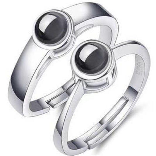 Minimalist photo projection couple rings feature an adjustable design, perfect for personalizing with photos or text. Trendy and creative, these rings make a unique statement for couples.