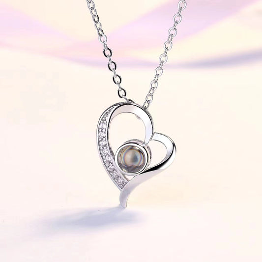 Hollow heart projection necklace with "I love you" in 100 languages, a trendy Christmas gift for her.