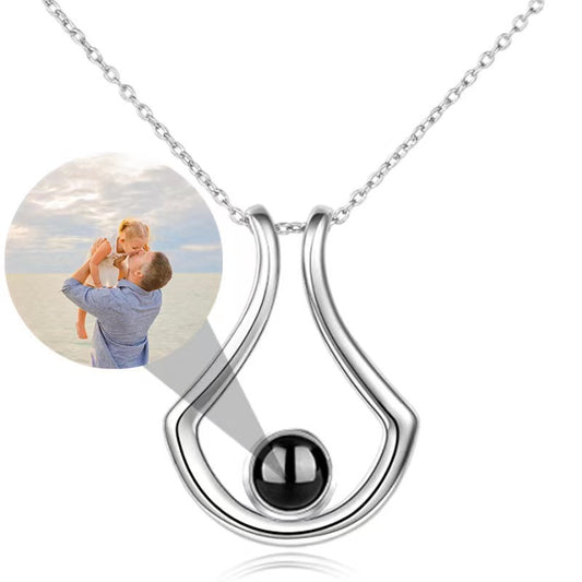 New customizable "I Love You" necklace in 100 languages, featuring photo and text options—perfect for Christmas gifts.