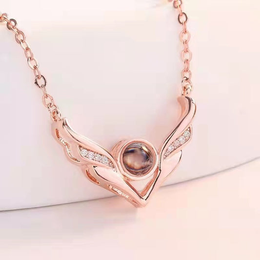 Deer-inspired projection necklace, "I Love You" in 100 languages. Minimalist gift for students, friends, and women.