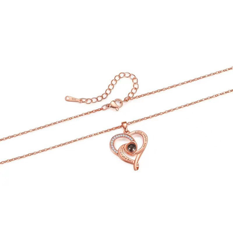 Hot-selling "I Love You" in 100 languages necklace, featuring a heart-shaped pendant, micro-paved design, perfect for moms.