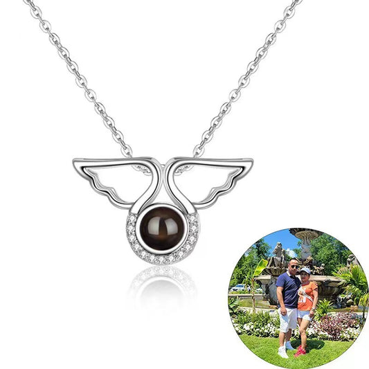 Customized angel wings projection necklace with 100 languages "I love you" and colorful photo.